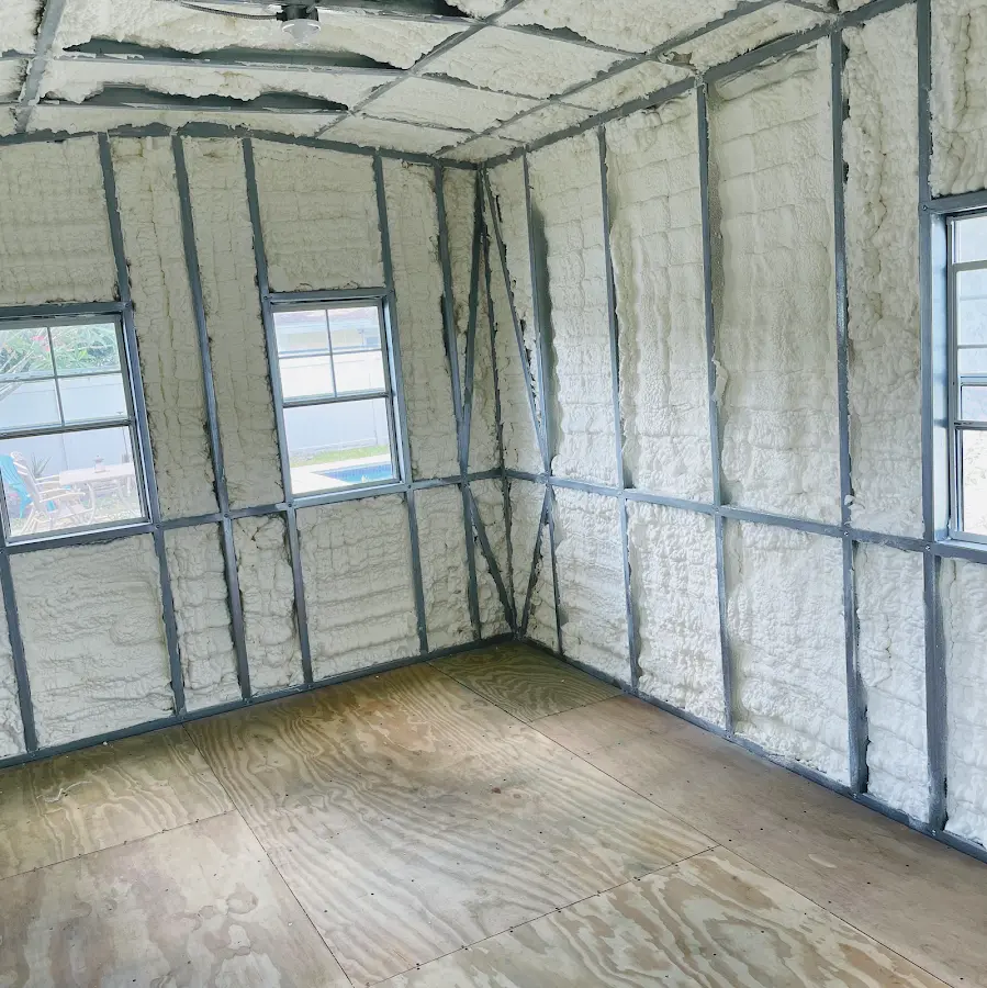 Closed-cell spray foam insulation applied to wall cavities in a residential project in Dunmore